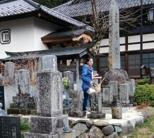 Tending to the family grave